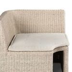 Angled upper view showing cushion fit and corner curve of the rattan banquette