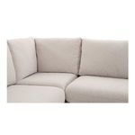 Close-up of corner seating cushions showing tight, smooth slipcover fabric in beige