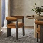Dining setting showing four Buxton Dining Chairs with dark wood table in modern styled room