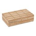 Interior shot focused on smooth white lining inside the travertine and brass shelled box