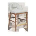 Inga Counter Stool with greenlight powder fabric upholstery, solid oak frame in morel brown, brass kick-plate on footrest