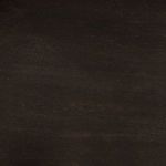 Close-up of black walnut wood grain and matte ebony finish on Zurich Console surface