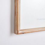 Close-up side view showing the textured natural wood grain and simple profile of the fir wood frame
