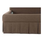 Close-up of corner junction on box pleat base and upholstered sides of Maren king bed