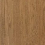 Close-up on a rounded corner of the sideboard showing smooth oak grain texture and edge
