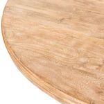 Close-up of tabletop edge corner emphasizing wood grain pattern and whitewash finish