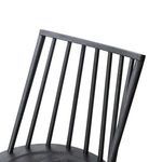 Detailed close-up showing rounded seat contour and connection to vertical slats