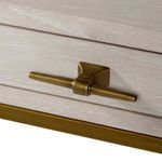 Close-up of antique brass drawer handle and wood grain on Ember Desk