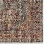 Detailed corner of Zakaria rug showing intricate traditional motifs with worn vintage look