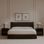Neutral bedroom with two Strand 1 framed prints hung side by side above upholstered gray bed