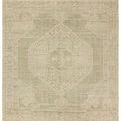 Handknotted traditional rug with vintage medallion design in muted green and cream, soft wool pile
