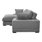 Side profile view of Plunge sectional highlighting thick cushions and square armrest