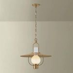 Cahill Lantern pendant shown hanging in room against beige wall