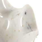 Close-up of interior corner with high-gloss finish and veining details
