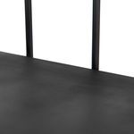 Zoomed view of distressed iron shelf surface with thin smooth edges