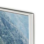 Detailed view emphasizing the precise corner and bright white float mount of the beach photo print