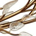 Clear textured glass leaves on gold branches with close-up view