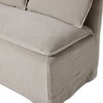 Back cushions lying loose on seat, illustrating bench’s flexible casual styling
