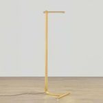 Deptford Floor Lamp with slim brushed brass frame, horizontal LED bar shade with knurling, and minimalist base