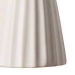 Close-up of reeded texture on white scalloped ceramic shade of Wilma Sconce