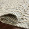 Folded Noelle Ivory / Blue Rug highlighting thick texture and raised geometric pattern