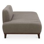 Side profile of Bennett Daybed showing backrest height and smooth upholstery texture