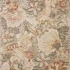 botanical area rug with large-scale floral print in natural beige, green, yellow, and rust tones