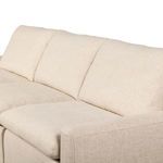 Close-up of three back cushions and two seat cushions with visible subtle fabric weave