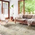 Skye Natural Sand Rug styled in a bright living room with modern furniture and large windows