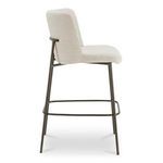 Side view of Early stool showing backrest height and metal frame with footrest detail