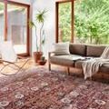 Samra Brick / Multi Rug styled in a bright living room with wood floors and large windows