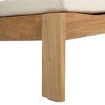 Repetition of close-up on teak wood leg with footpad