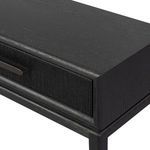 Angled close-up of console table drawer showing texture and handle detail
