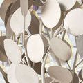 Close-up showing smooth, round silver metal discs and thin curved metal branches of the chandelier