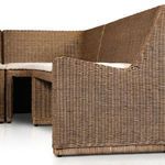 Close-up detail of rattan armrest and seamless weave connections