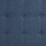 Close-up of indigo twill linen showing subtle texture and button tufting