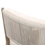 Close-up angle of chaise’s backrest rope texture and pillow edge