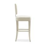 Side profile of bar stool emphasizing seat thickness and straight legs with footrest
