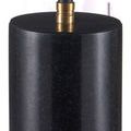 Close-up of tall cylindrical black marble base with matte brass accent at stem