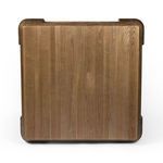 View of the underside showing the base panel’s wood grain and the table’s square shape