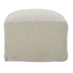 3/4 angle of slipcover ottoman highlighting cushion plumpness and fabric texture