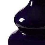 Close-up on glossy mako blue ceramic lamp base showing smooth curves and reflective finish