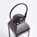 Close-up of rounded top handle and smooth roof of Antoinne Outdoor Lantern