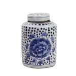 Tea jar shown from a slightly angled front view highlighting floral and dot patterns