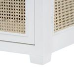 Close-up of bottom corner of Ariel 2-Door Cabinet showing white lacquered wood frame and woven cane panels