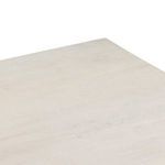 Close-up showing corner edge and wood grain texture on console table