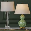 Close-up group shot with Duveen Table Lamp next to green glazed ceramic lamp on marble surface