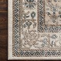 Close-up corner of Teagan rug on dark hardwood floor highlighting pattern and texture