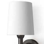 Close-up of Jameson Sconce showing white fabric shade texture and smooth black metal base
