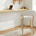 Lila rug runner styled in light-filled room under counter with upholstered wooden chair